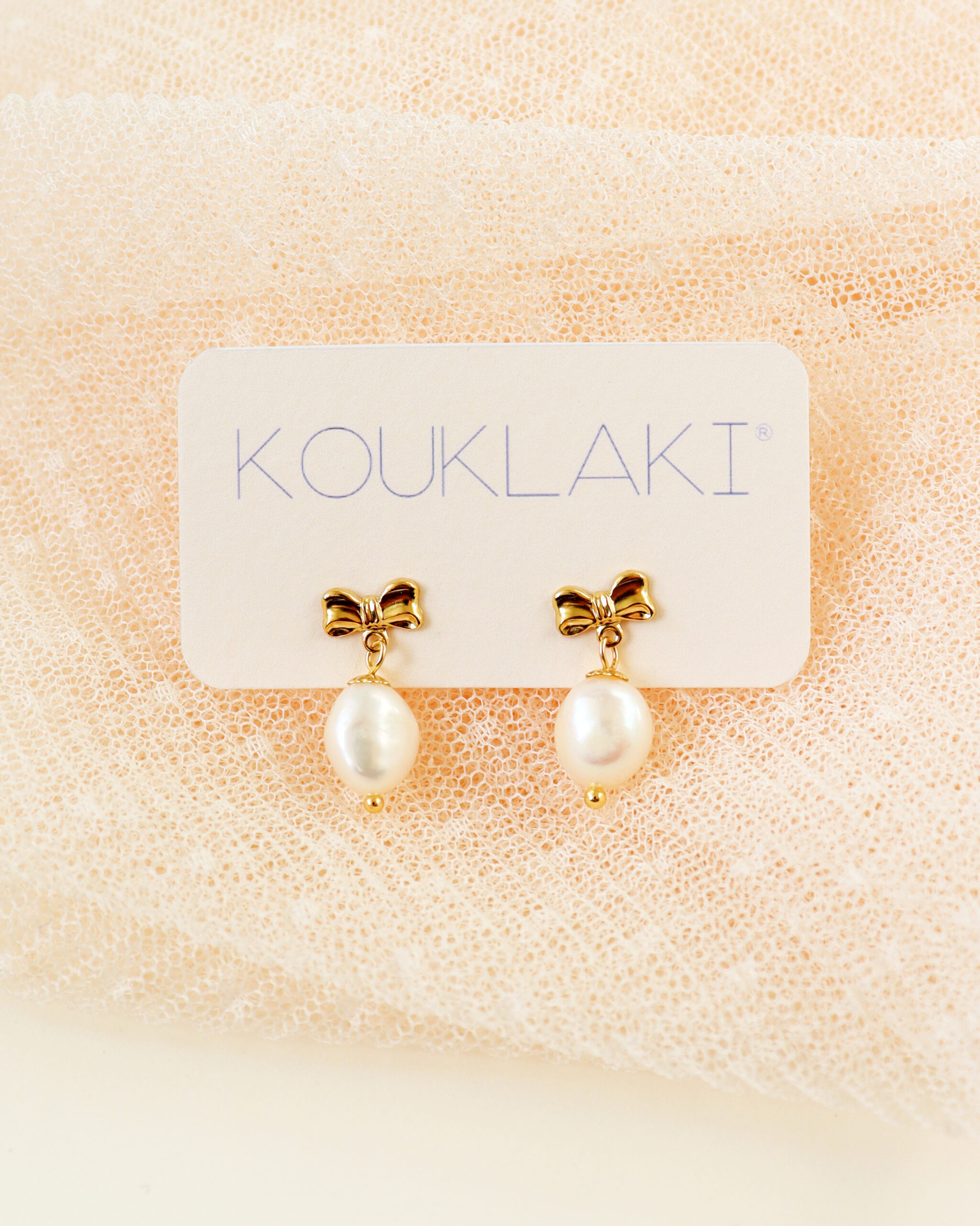 Boucles d'oreilles BOW . petit format . Gold Filled 14k . série limitée